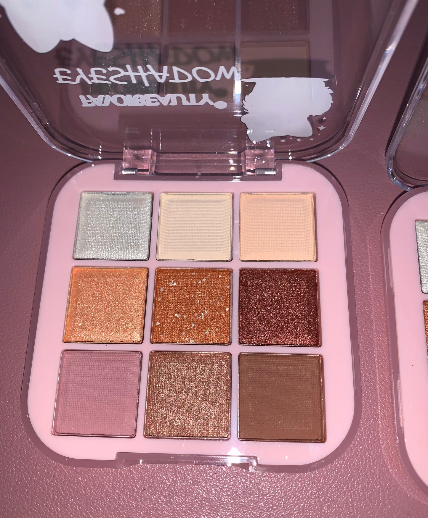 2 small eyeshadow palettes