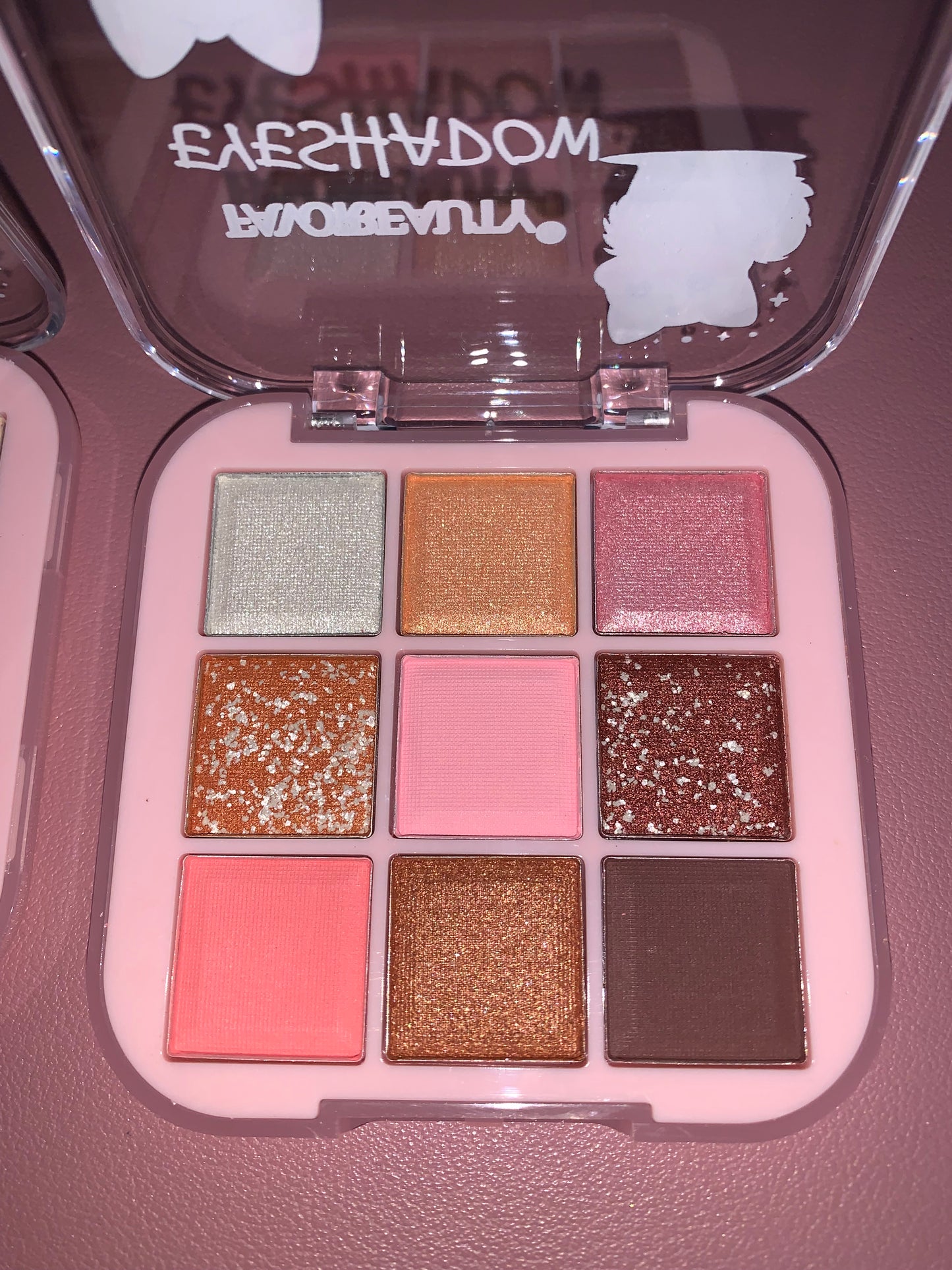 2 small eyeshadow palettes